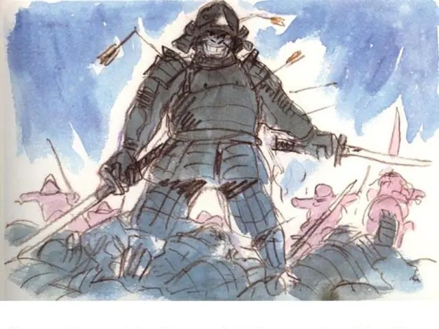 Unexpected finding on a city street: a temporary mountain made of clothing, accompanied by a...