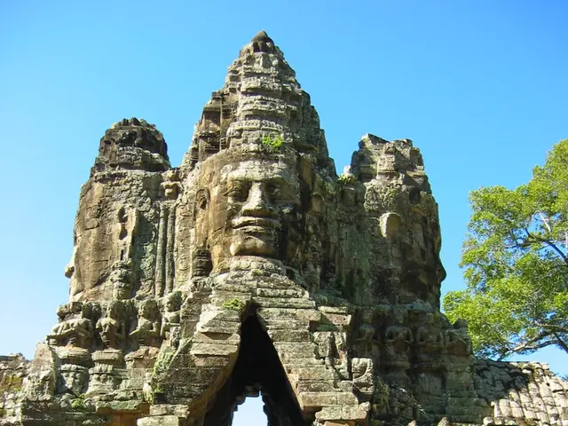 In the image we can see there is an elephant on which people are sitting and on the top there is a...